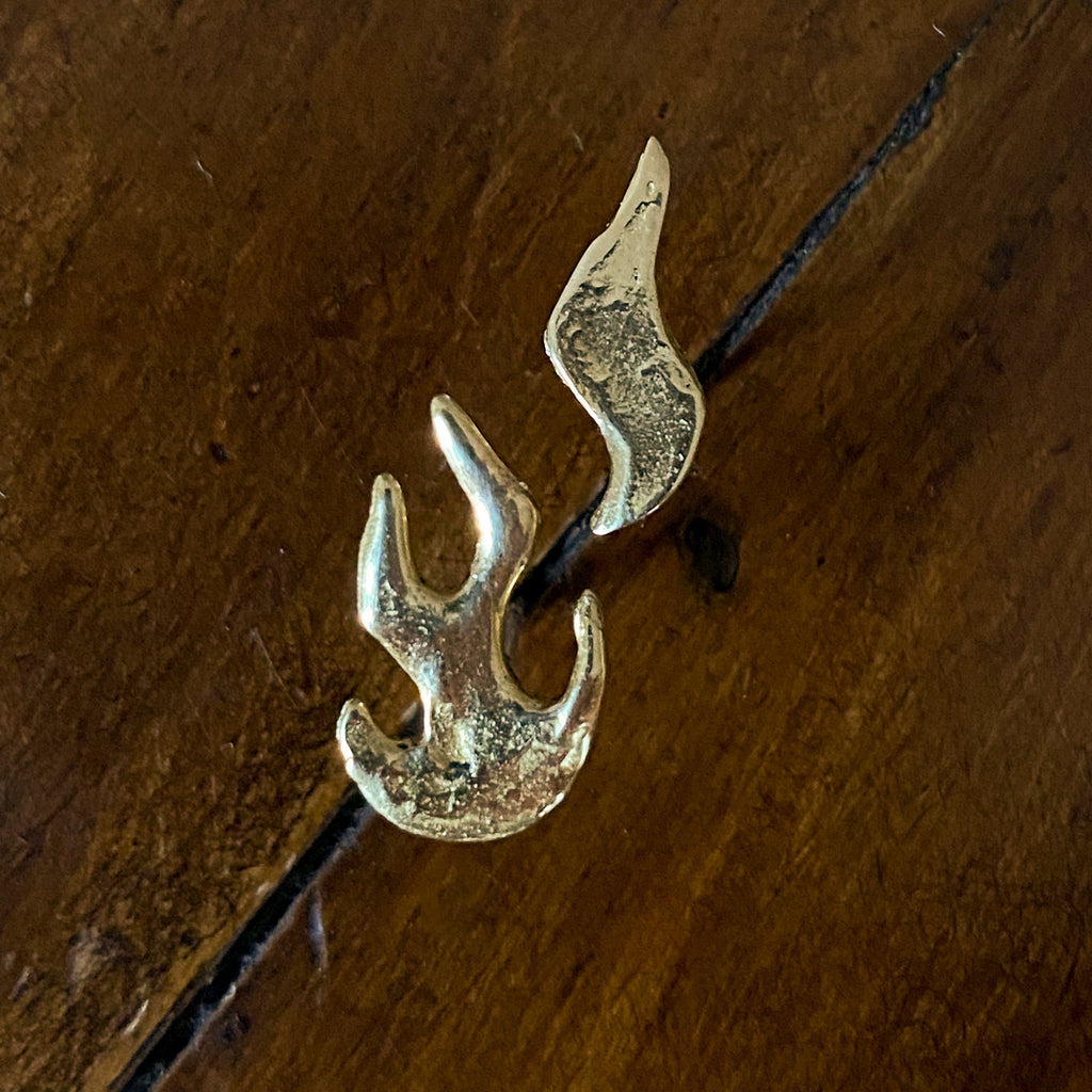 Flame Earrings in bronze, product shot on dark wood — Zefiro Jewels